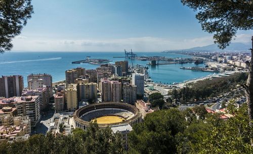 View of cityscape against blue sky