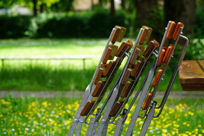 Close-up of stacked outdoor chairs