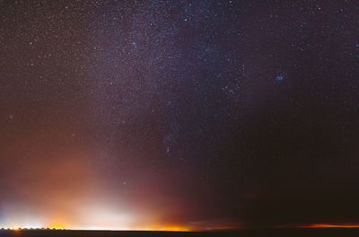 Scenic view of sea against sky at night