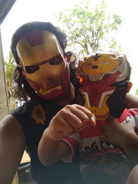 Portrait of a girl holding camera