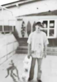 Full length of woman standing on bench