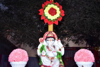 Close-up of statue of flower bouquet