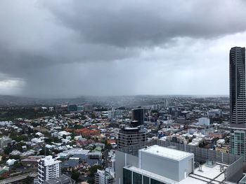 High angle view of buildings in city against sky