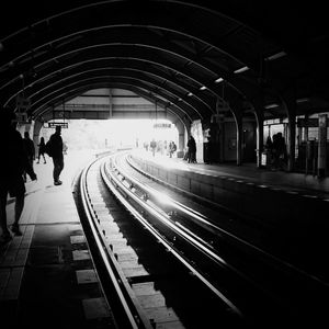 People at railroad station