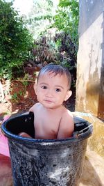 Portrait of cute boy in park