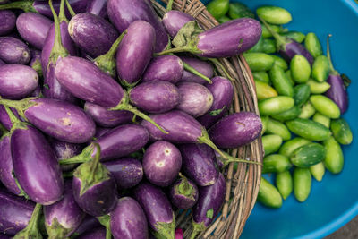 High angle view of eggplant vegetables in basket at market