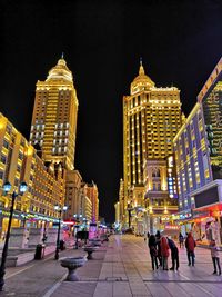 People on street at night