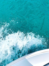 High angle view of water splashing in sea