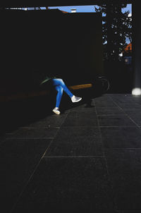 Woman standing on road