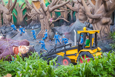 High angle view of people relaxing on plants