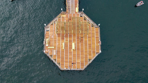 High angle view of yellow floating on sea