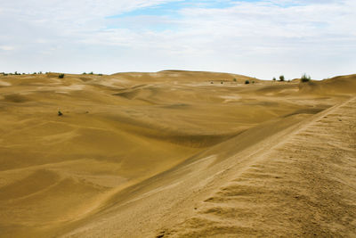 Scenic view of desert against sky