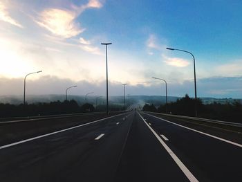 Empty road against sky