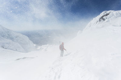 Scenic view of snowcapped mountains during winter
