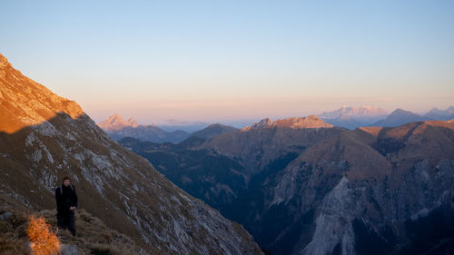 Scenic view of mountains against sky during sunset