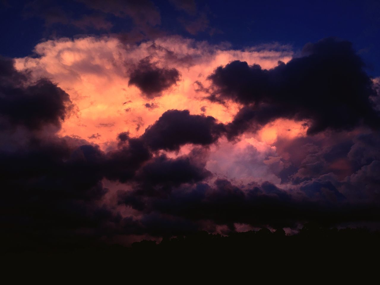 sky, cloud - sky, beauty in nature, scenics, tranquility, tranquil scene, cloudy, cloudscape, silhouette, dramatic sky, nature, weather, sunset, low angle view, overcast, idyllic, cloud, majestic, atmospheric mood, storm cloud