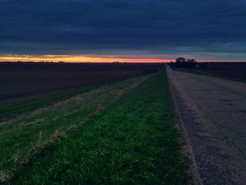 Road passing through field