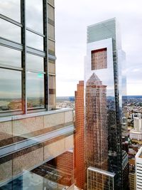 Modern buildings against sky in city
