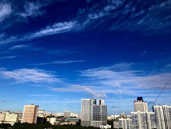 Modern buildings against blue sky