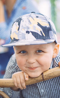 Close-up portrait of boy standing outdoors