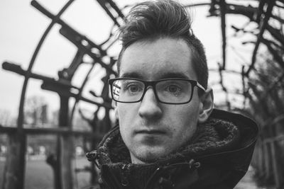 Portrait of young man wearing eyeglasses