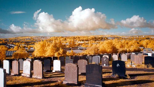 Panoramic view of cemetery against sky