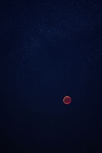 Low angle view of moon against sky at night