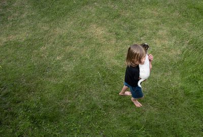 Full length of woman on field