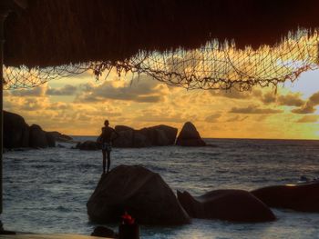 Scenic view of sea at sunset