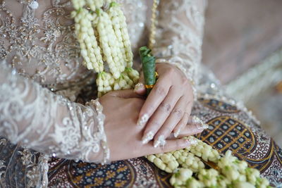 Midsection of woman holding food