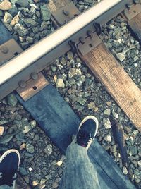 Low section of man on railroad track