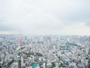 High angle shot of cityscape against sky