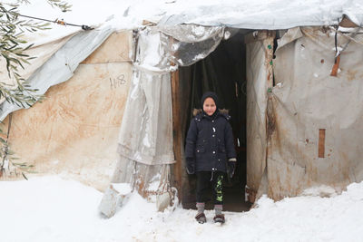 Syrian refugee children playing in the snow that fell on the camp near the syrian-turkish border.