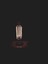 Illuminated light bulbs in darkroom