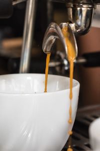 Close-up of coffee cup in cafe