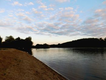 Scenic view of lake at sunset