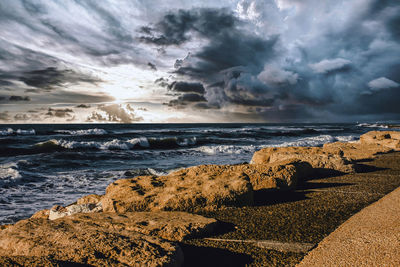 Scenic view of sea against sky during sunset