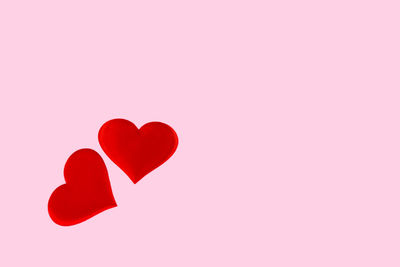 Close-up of red heart shape on paper