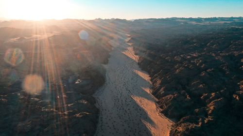 High angle view of man standing on mountain