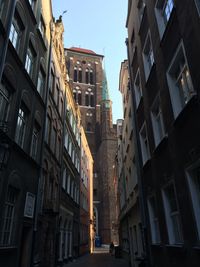 Low angle view of buildings against clear sky