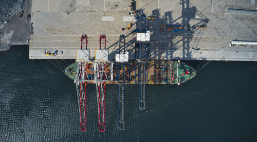 High angle view of sailboat at commercial dock