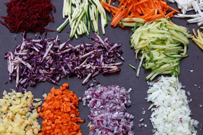 High angle view of chopped vegetables arranged at counter