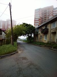 Road leading towards buildings