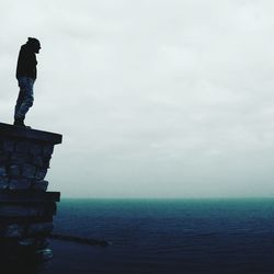 View of man standing at seaside