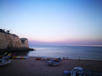 Scenic view of sea against clear sky during sunset