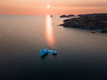 Iceberg at dusk in spring in twillingate, newfoundland, canada