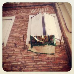 Low angle view of window of house