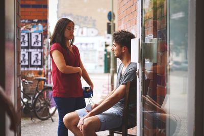Woman standing in city