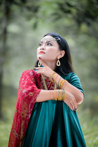 Young woman standing outdoors