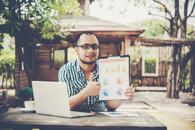 Close-up of man working outdoors